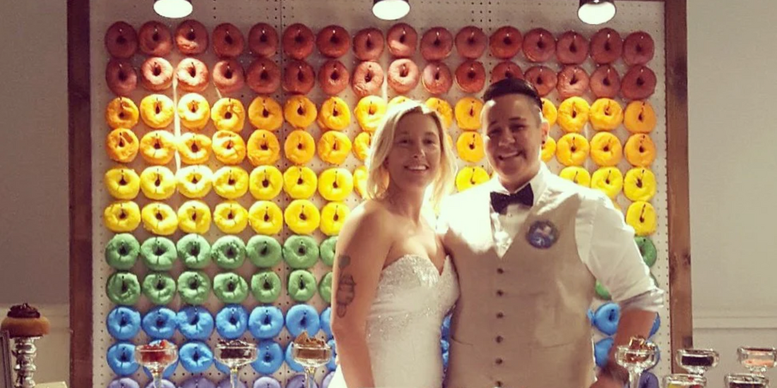 Wedding Celebration complete with cupcake bar, doughnut bar, and rainbow doughnut wall
