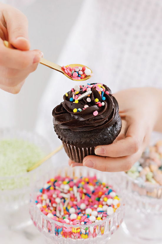 Custom chocolate cupcake gets custom sprinkle topping at event